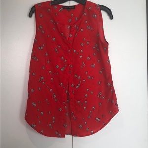Red sleeveless blouse